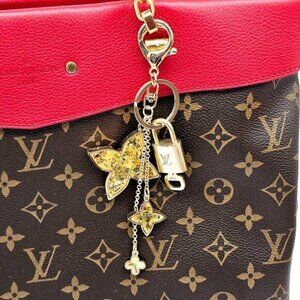 Authentic Louis Vuitton Lock & Key with unbranded Clover Flower Bagcharm 101525